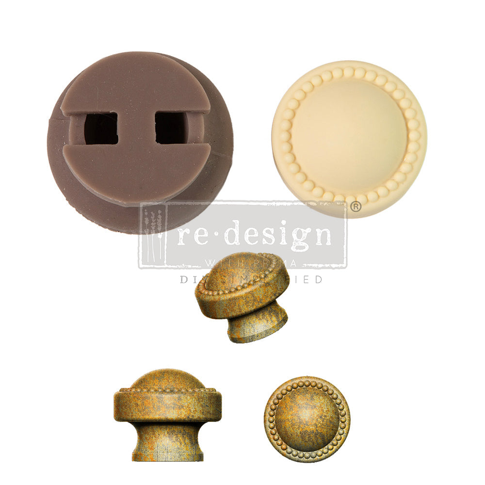 A product image displays components and finished examples for a decorative furniture knob. In the upper left is a brown silicone mould insert with two rectangular openings. Beside it is a cream-colored circular knob face featuring a smooth center bordered by a ring of raised bead details. Below are three views of the completed knob in an antique gold metallic finish: an angled perspective, a side profile, and a top-down view. The knob has a rounded domed top with a beaded border and a short cylindrical base