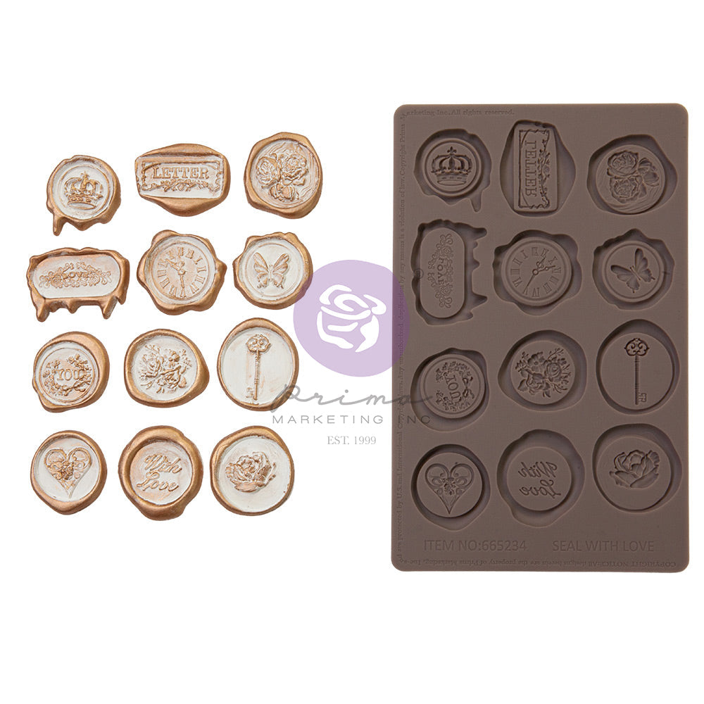 A product comparison image displays a collection of wax seal-inspired embellishments beside their matching silicone mold on a clean white background. On the left, twelve finished seal castings are arranged in neat rows, each painted in creamy ivory with antique gold edging for a vintage wax seal appearance. The designs include crowns, roses, butterflies, ornate keys, hearts, clocks, and decorative lettering such as “With Love” and “Letter.” Some seals are circular while others are oval or rectangular with d