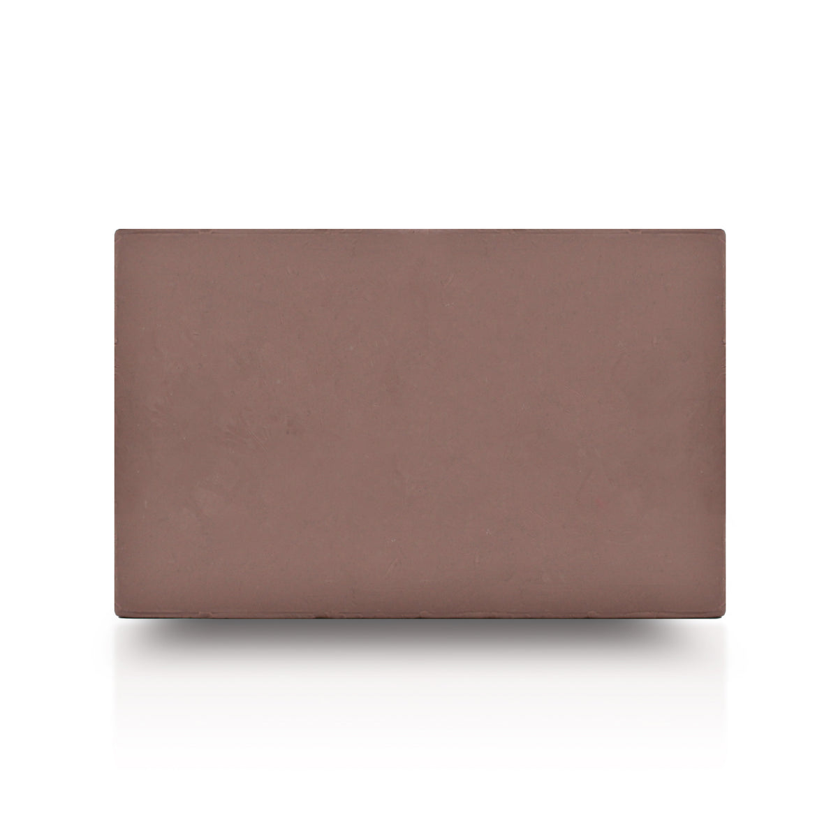 Rectangular block of brown oil-based sculpting clay with a smooth matte surface displayed on a light gray background.